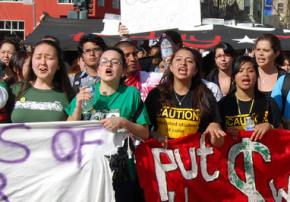Students march against cuts spurred by the financial crisis